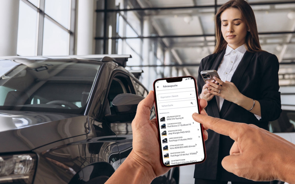 Person sucht ein Fahrzeug über die Stellplatzmanager App.